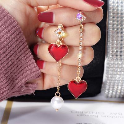 China Trendy drop fashion asymetry crystal earrings red heart for sale