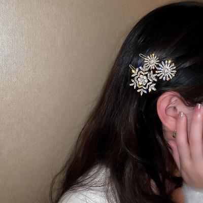 China 2021 Fashion Flower Snowflake Girls Crystal Hair Clips AH680 for sale