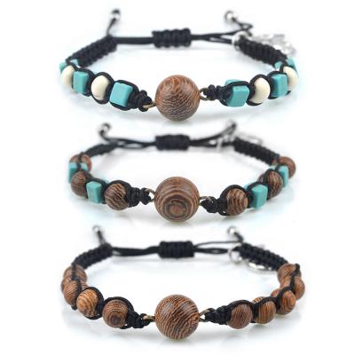 China Religious Wooden Stone Beads Catholic Women Men Catholic Jewelry Adjustable Woven Cross Religious Bracelet for sale