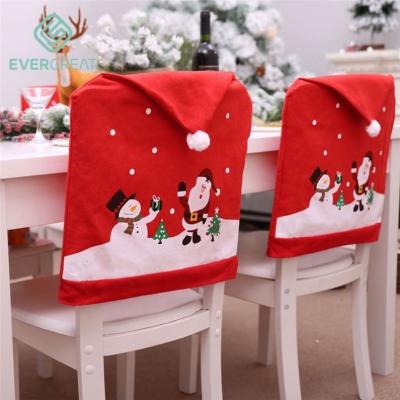 China Simple Christmas Chair Covers Santa Hat Chair Covers Holiday Home Decor Christmas Table Decor Elegant Christmas Chair Covers for sale