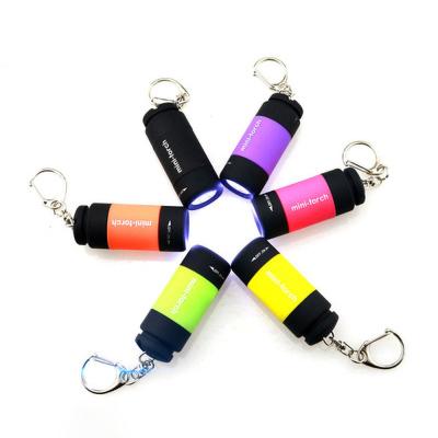 China Convenient USB LED Light Torch Ring Lamp Pocket Portable Mini Key Chain Waterproof Rechargeable UV Flashlight for sale