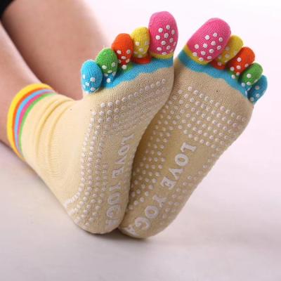 China Women Antibacterial Custom Colored Cotton Anti Slip 5 Toe Yoga Grip Socks Pilates Socks Wholesale for sale