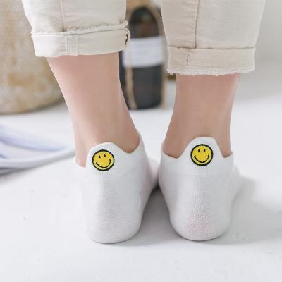 China Low Price Cut 10 Colors Embroidery Smiling Face Cheap Sporty Cute Women Socks for sale