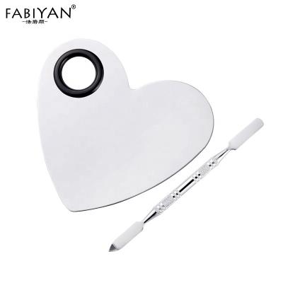 China Convenient Heart Shaped Stainless Steel Makeup Palette Nail Art Eye Shadow Foundation Mixing Cosmetic Tray With Spatula for sale