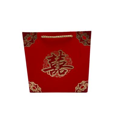 China Bargain Price Recyclable Handle Portable Custom Packaging Paper Bags With Rope for sale