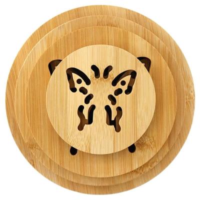 China 4Pcs Hot Selling Non-slip Foot Mat With Kitchen Place Mat Heat Butterfly Wooden Table Round Coaster Accessory Hot Sale Sustainable 4Pcs for sale