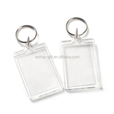 China Tranasprent quality white acrylic key chain hotel plate number frame plastic key chain for sale