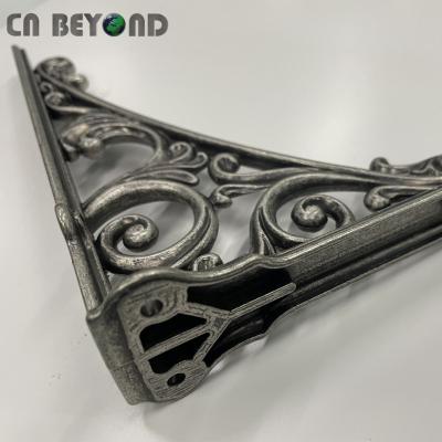 China 90 Degree Triangle Rust Resistant Design Right Angle Wrought Zinc Hollow Brackets for sale