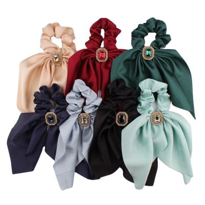 China Popular high quality summer and autumn hair decoration elastic hair bands rabbit ears hair scrunchies with tail for sale