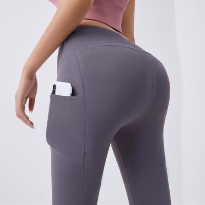 China Factory Sale New Products Yoga Gaiters Woman Antibacterial Yoga Pants With Pockets Workout Running Sportswear for sale