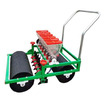 China Farm machinery hand push grain soybean seed planting machine and multi functional seeder with fertilizer box planter machine for sale