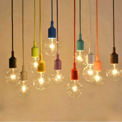 China New Modern Creative Minimalist Macaron Color Led Lampara Colgante Children Dining Living Room Long Candle Modern Pendant Light Chandeliers for sale