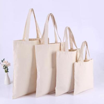 China Eco-friendly Economic Universal Machine Wash Bulk Natural Cotton Tote Blank Cloth Bags With Long Handle for sale