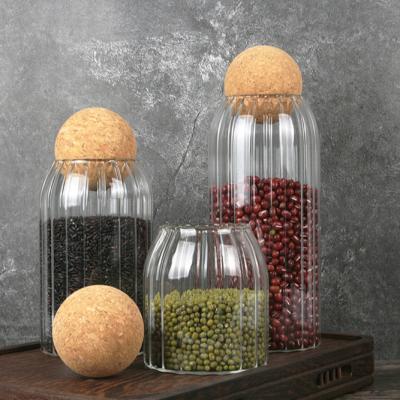 China Wholesale Different Size Freshness Preservation High Borosilicate Storage Candle Bottles Airtight Clear Food Glass Jar With Bamboo Lid for sale