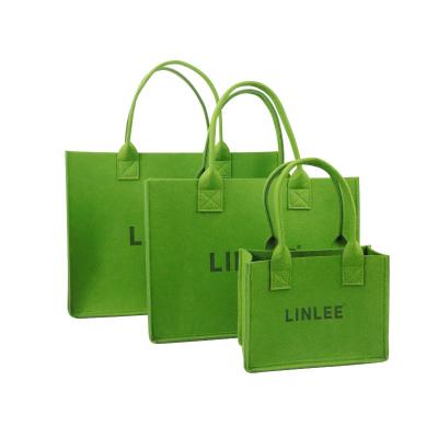 China Who respects the environment; Recyclable; 2022 Reusable One Hottest Soft Shoulder Tote Bag Simple Letter Felt Handbag Felt Gift Bag Office Bag for sale