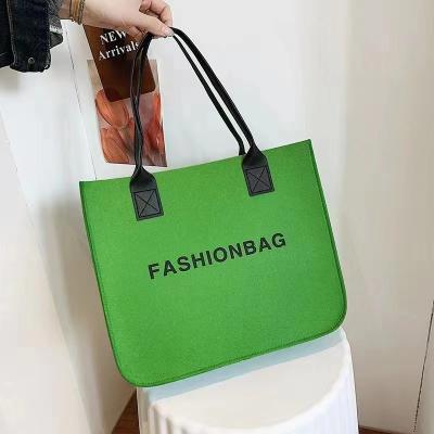 China Who respects the environment; Recyclable; Reusable Custom Large Felt Portable Bag Cheap Fashion Shoulder Hand Felt Tote Bag Ladies Shopping Bag With Leather Handle for sale