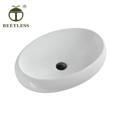 China High Quality White Ceramic Egg Shaped Bathroom Sink Countertop Modern Basin Countertop Bathroom Sink and Good Price for sale