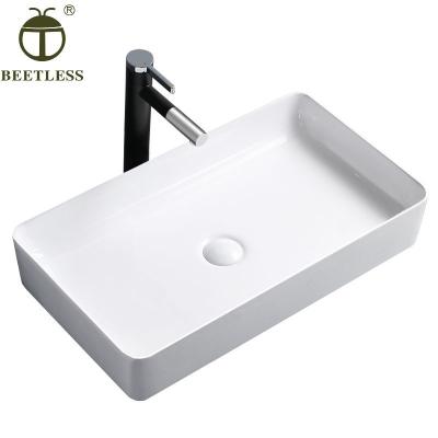 China Modern Hot Selling Table Top Countertops Basin Vanity Hotel Ceramic Wash Basin Hotel Small Luxury Bathroom Sinks for sale