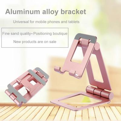 China Universal Smartphone and Mobile Tablets Adjustable Desktop Cell Phone Stand Waterproof Universal Logo Foldable Custom Phone Holder Wholesale Tablet Stand Aluminum for sale