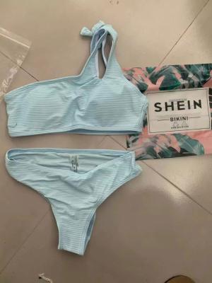 China Hot Selling Plus Size Solid Color Strappy Chain Swimwear and Sexy Beach Wear Women Bikini for sale