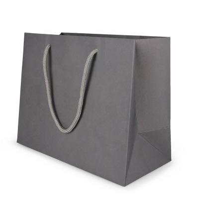 China Logo Design Luxury Paper Bag Disposable Customized Gift Packaging Bag Shopping Paper Bag For Sale for sale