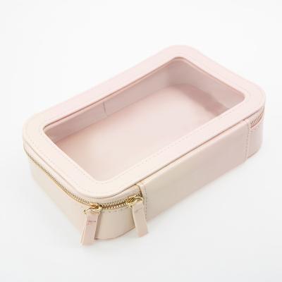 China Hot Selling Fashion PVC PU Leather Toiletry Bag Waterproof Clear Makeup Bag Pink Transparent Cosmetic Bag for sale