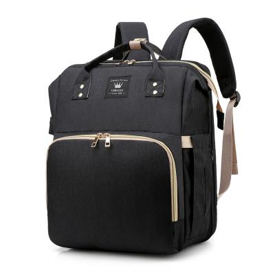 China Multifunctional Purpose Diaper Bag Mommy Diaper Backpack Water Resistant Bag With Changing Station Pad for sale