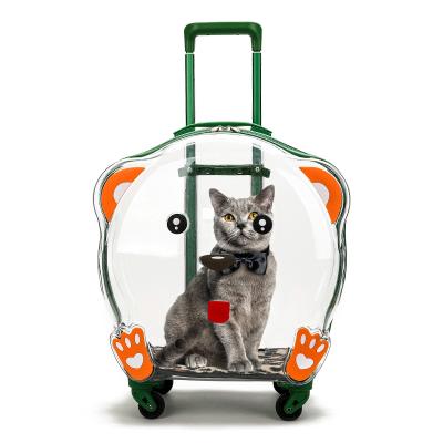 China Transparent Cat Bag Pet Cat Pull Rod Box Breathable Pet Outdoor Kitten Movable Wheel Handbag Traveling Pet Breathable Box for sale