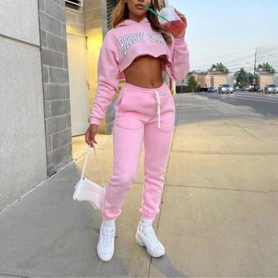 China QUICK DRY Women's Fashion Letter Printing Sweatsuit Women's Fashion Textile Hooded Oti Crop Top Jogger Pants Set Two Piece Set Tracksuit Fitness Outfits for sale