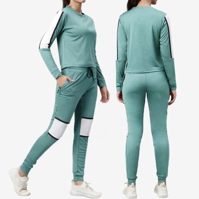 China Oti QUICK DRY Textile Latest Design OEM 2 Piece Sweatshirts And Jogger Pants Slim Fit Tracksuits For Women Spring Set Sporty Style Women for sale