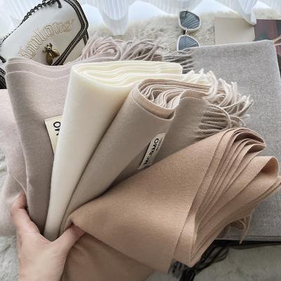 China Cashmere Trend Of Autumn And Winter Solid Color Scarves Thickening Warm Ladies With Tassel Cashmere Scarf Shawl for sale