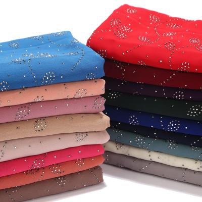 China Wholesale Chiffon Solid Color Long Style Small Leaf Pattern Hijab Travel Decoration Pearl Scarf Women Chiffon Hijab for sale