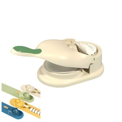 China 2 in 1 Viable 2 in 1 Dumpling Maker 2023 New Kitchen Dumpling Making Tool Baking Pastry Manual Artifact for Pressing Dumpling Skin Maker for sale