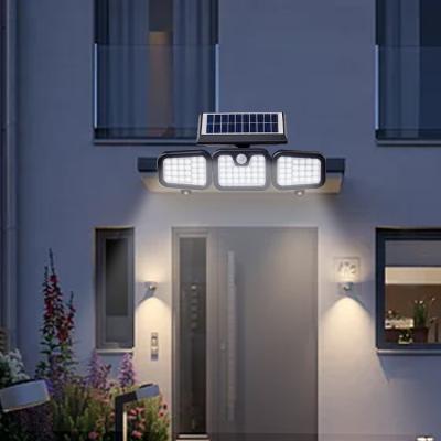 China Newest Motion Sensor IP65 Outdoor Led Solar Wall Light Energy Saving Super Bright Waterproof Solar Door Lights for sale