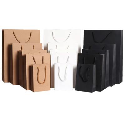 China Kraft Paper White Paper Bags Recyclable Packaging Handbags Custom Gift Bags Clothing Bags for sale