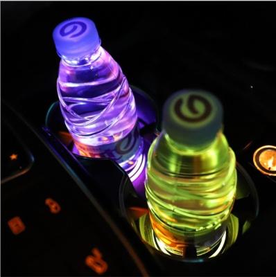 China Hot Selling Matte Colorful Led Drink Glass Bottle Atmosphere Blue /Red/ RGB Car Cup Holder Led Coaster Interior Coaster Automotive Industry for sale