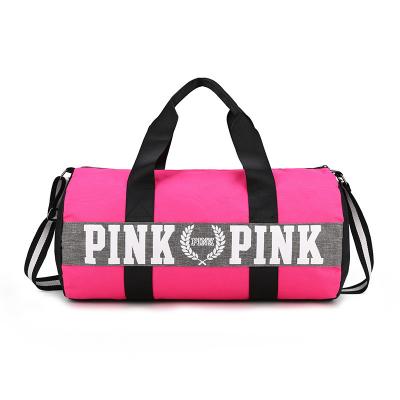 China Fashion Large Capacity Female Fitness Storage Shoulder Travel Duffle Sports Outdoor Pink Gym Bag for sale