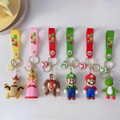 China Self-Defense Items For Mario Collection Anime Cartoon 3D Doll Woman Key Chains Wholesale Classic Super Car Key Ring Soft Silicone Backpack Pendant for sale