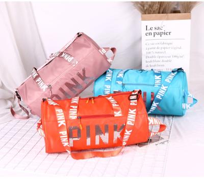 China Pink Customized Logo Gym Women Sports Travel Waterproof Bag Large Capacity Fashion Duffel Bags for sale