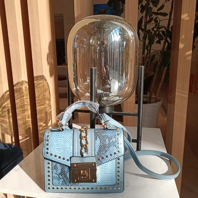 China Fashion designer lock snakeskin pu leather bag purses and handbags wholesale custom made women with rivet for sale