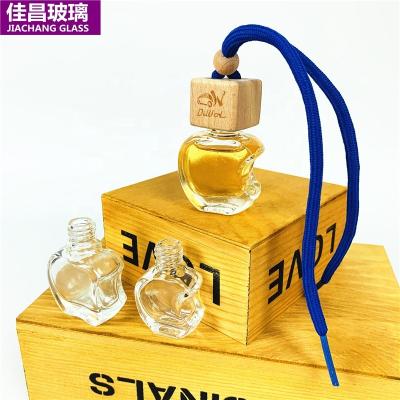 China High Quality Perfume Flange 5ml10ml12ml Clear Round Wooden Cap Car Glass Perfume Bottle for sale