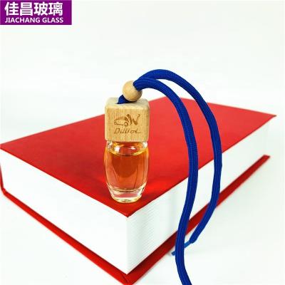 China PERFUME Car Perfume Bottle Cylindrical Glass Pendant 10ml Perfume Hanging Car Diffuser Bottle for sale