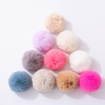 China 2021 Garment factory wholesale 10cm faux fox fox fur pom pom or raccoon fur pom pom ball with snap for sale