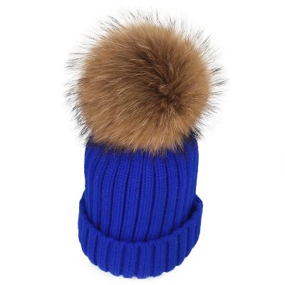 China Medium factory wholesale winter knitted real raccoon fur pom pom ball pom poms beanie hat for women for sale