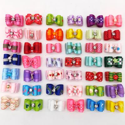 China Viable Most Cute Cheap Pet Dog Hair Band Popular Cute Accessories Various Styles Maintain Dog Hair Accessories for sale