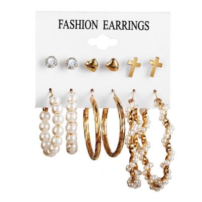 China FASHIONABLE hot sale price cheap gold plated circle metal twist cross pearl set earrings for women for sale