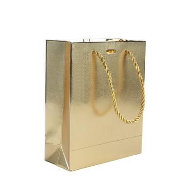 China Canton BIODEGRADABLE factory wholesale custom luxury gold gift craft drawstring handle paper bags for jewelry for sale