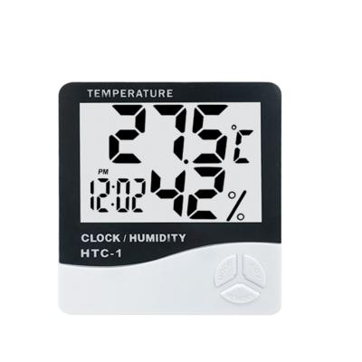 China Portable Free Sample Handheld Indoor and Outdoor Calendar Weather Display LCD Display Electronic Thermometer and Hygrometer for sale