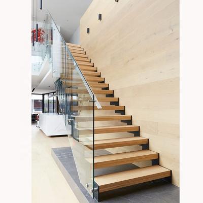 China Contemporary Luxury Floating Wood Staircase Design Stairs With Glass Enclosure Wood Treads for sale