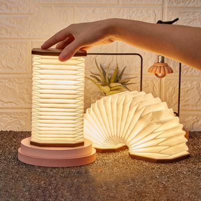 China Hotsale Gift Modern Creative Wooden Foldable Simple Book Lamp Atmosphere Simple Bedside Led Night Light for sale